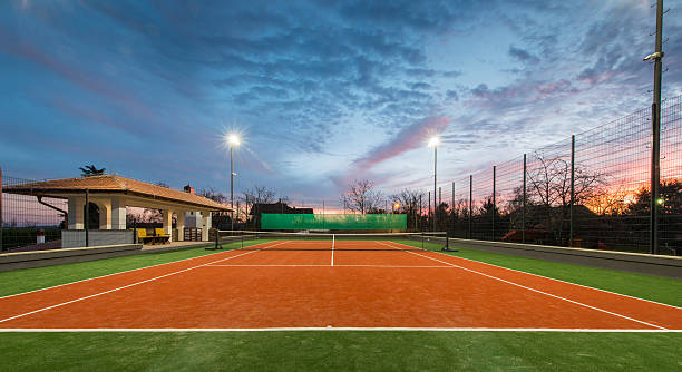 Comment le type de sol influence-t-il la construction court de tennis Angers et la pose du revêtement ?